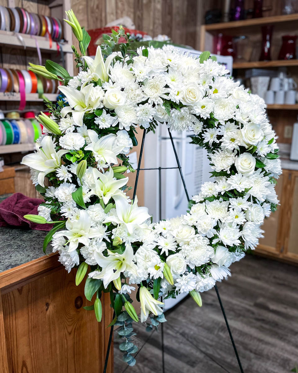 All white funeral wreath from Annaville Florist