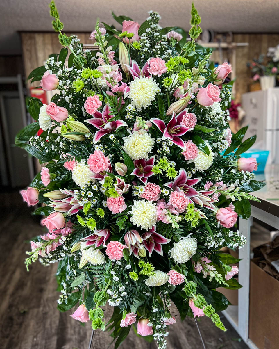 Pink, white and fuchsia funeral spray from Annaville Florist