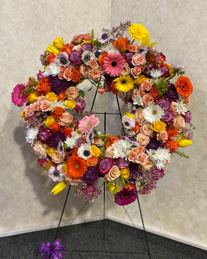 Modern, Organic Funeral Wreath with Pink, Orange, Purple and Yellow