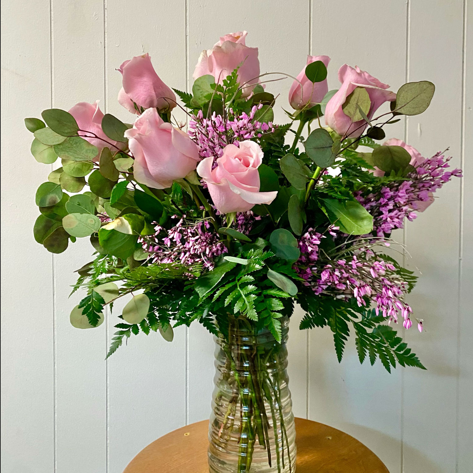 pink-dozen-silver-dollar-genestra-SQ Light Pink Dozen Roses with Silver Dollar Eucalyptus